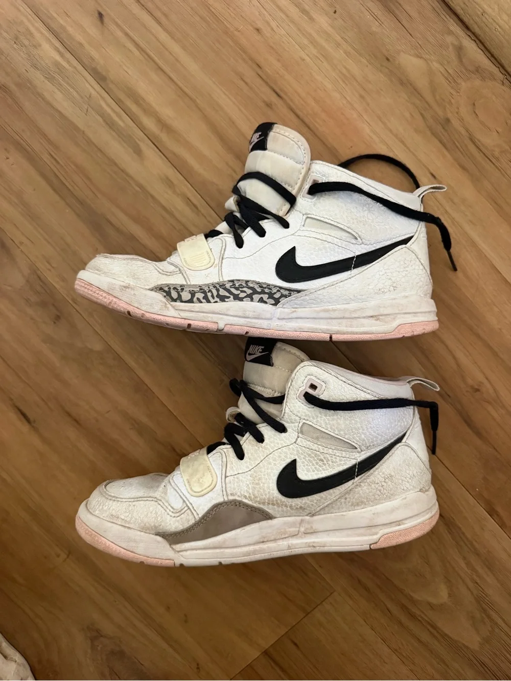 Nike Kids size 3 White and Black High-Top Sneakers with Pink Sole Accents